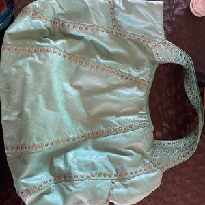 Turquoise leather Kooba handbag.